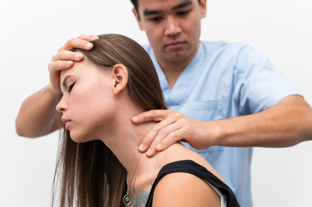 Physiotherapist treating neck pain and headaches in Caledon
